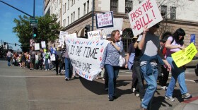 Marchers take to the streets of downtown San Diego to urge Congress to pass health care reform, March 16, 2010.