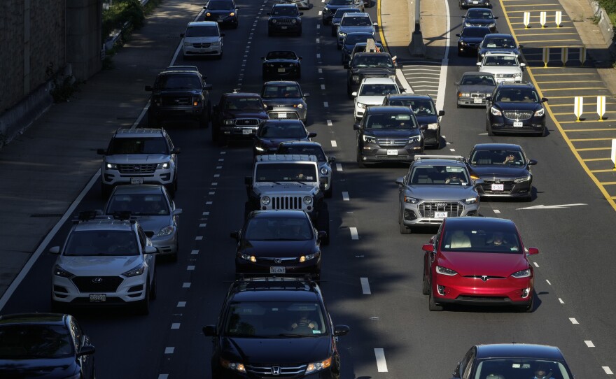 Traffic moves along Interstate 395 on Friday morning in Washington, D.C.