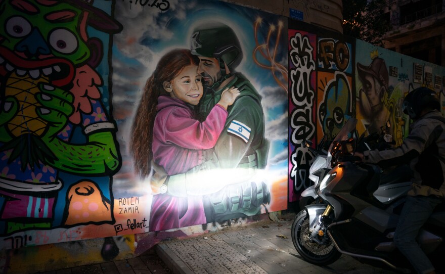 Graffiti murals put up after Oct. 7 in Tel Aviv, Israel.