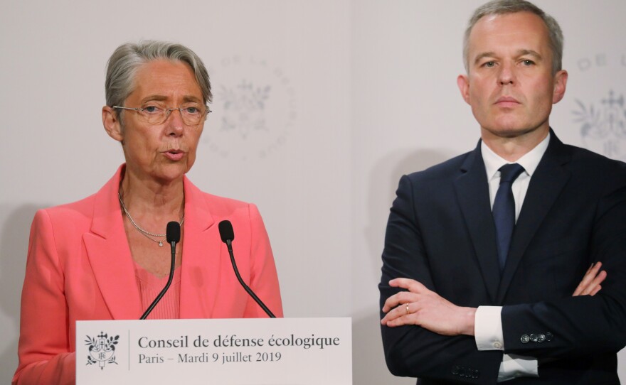 French Transport Minister Elisabeth Borne says a new tax on airfares "is a response to the ecological urgency and sense of injustice expressed by the French." She's seen here with Minister for the Ecological and Inclusive Transition Francois de Rugy.