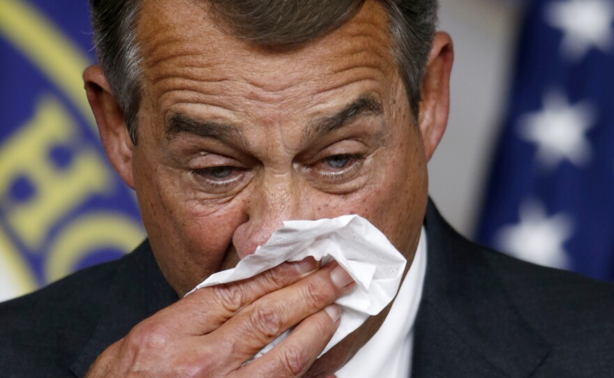 House Speaker John Boehner gets emotional and wipes his face during a news conference on Capitol Hill in which he announced he would be resigning at the end of October.