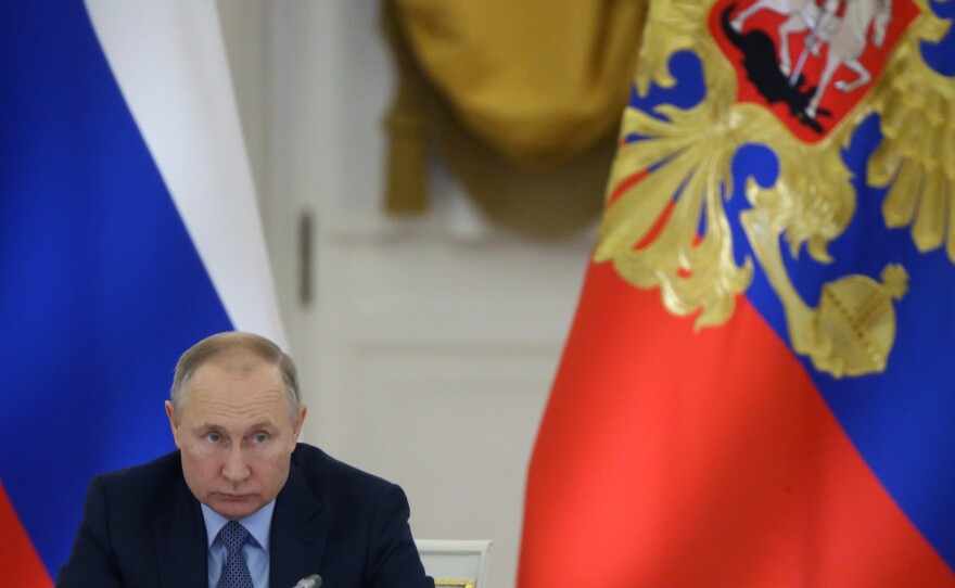 Russian President Vladimir Putin speaks during the State Council's meeting at Grand Kremlin Palace on Dec. 26 in Moscow.