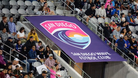 Soccer fans watch an NWSL match featuring San Diego Wave FC at Snapdragon Stadium.