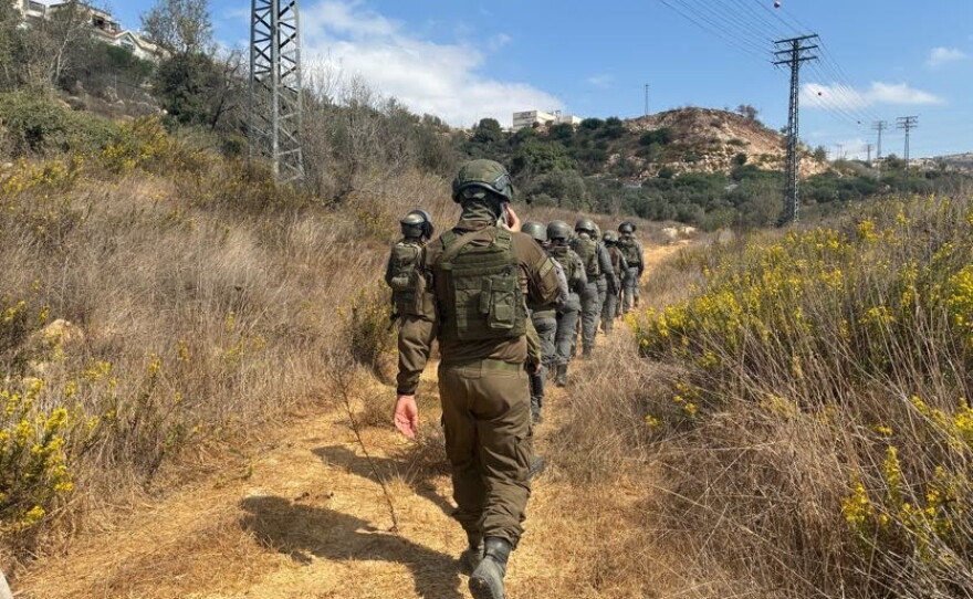 Israeli security forces, including military and police, declared a closed military zone around a olive grove and escorted activists and rabbis away from the area before detaining them near the Israeli settlement of Beitar Illit in the occupied West Bank.