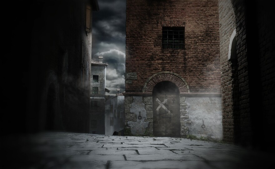 14th-century street view of Siena, Italy at night.