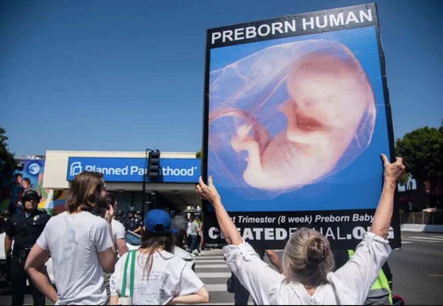 Anti-abortion protestors outside a Planned Parenthood clinic in Highland Park, Los Angeles on May 7, 2022. 