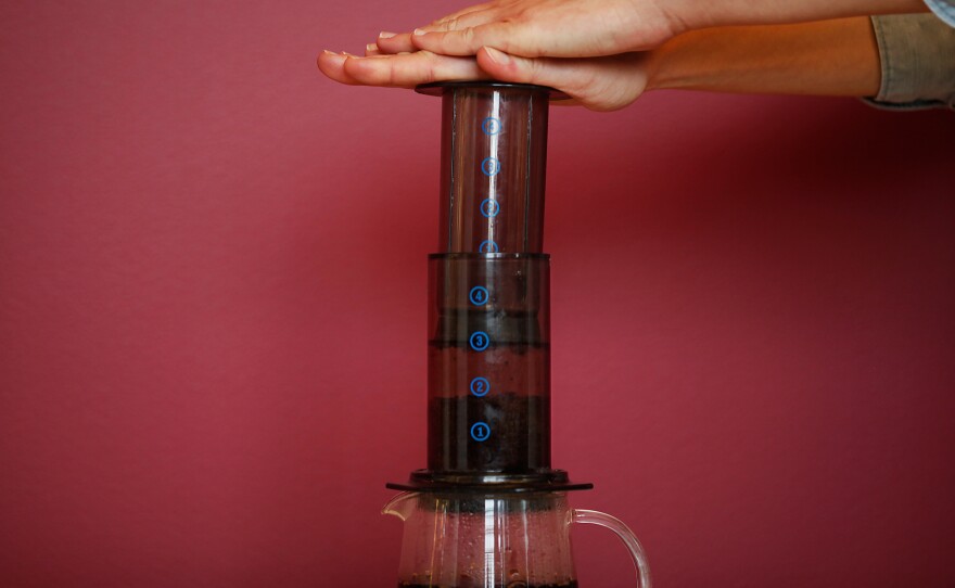 Emma Bowman makes herself a cup of espresso with the AeroPress.