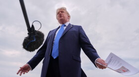 President Donald Trump speaks with reporters before boarding Air Force One, Friday, Aug. 14, 2026, at Joint Base Andrews, Md.
