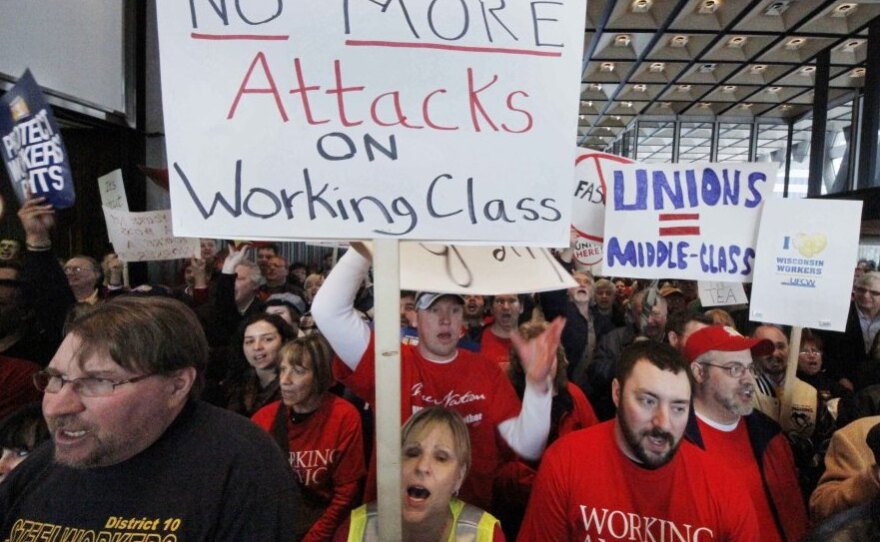 Supporters of Wisconsin public employees rally at the United Steelworkers headquarters in downtown Pittsburgh.