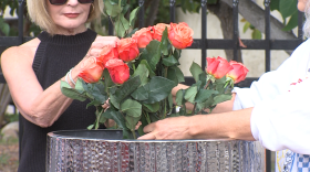 Roses are placed in a vase as a memorial for the 144 victims of PSA Flight 182 on the 47th anniversary of the jet crash in the North Park neighborhood of San Diego, Calif., on Sept. 25, 2025.