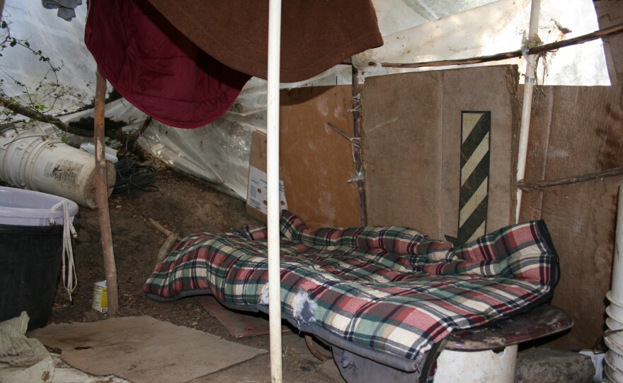Bedding inside a migrant worker's makeshift house in Carlsbad, Feb. 23, 2015.