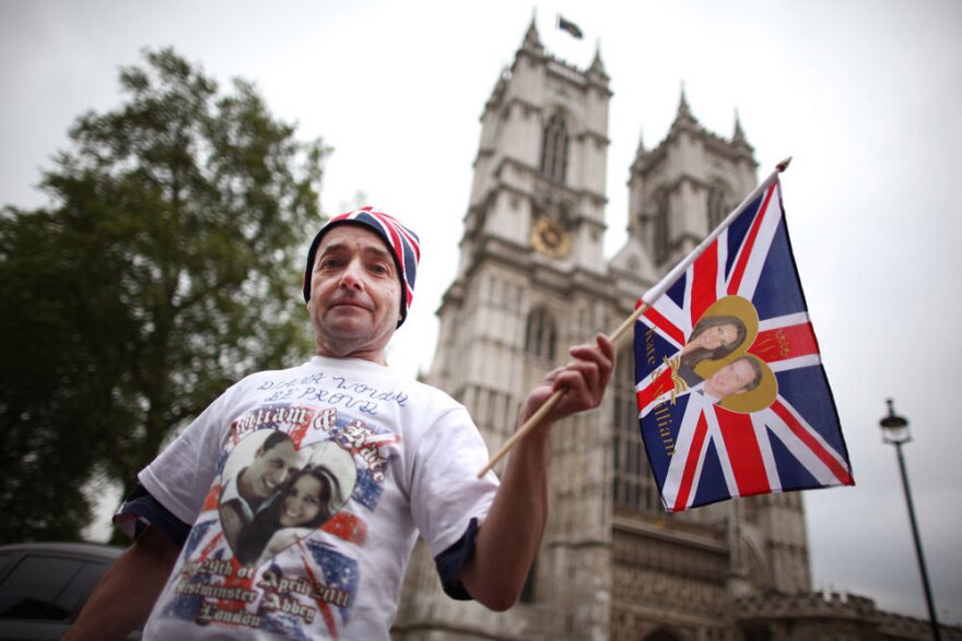 Royal fan John Loughrey camps out on the streets outside Westminster Abbey Tuesday, in anticipation of England's royal wedding.