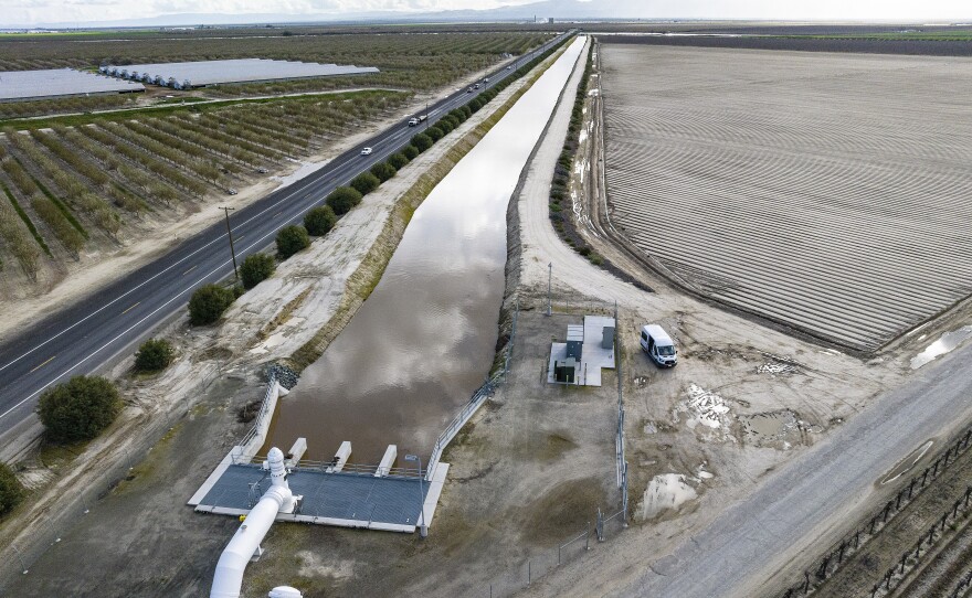 In this aerial drone photo provided by the California Department of Water Resources, the primary pump in the foreground is part of a groundwater recharge project designed to capture excess flow for groundwater storage in Fresno County on March 13, 2023.
