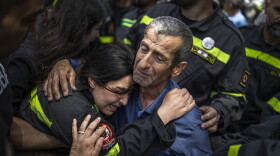 The father of Hussein Jaber, who was killed in an Israeli strike on Nabatieh, in southern Lebanon, on May 12, cries during the funeral ceremony in Sidon the following day.