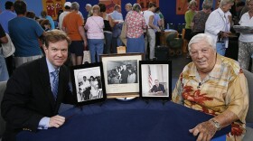 Francis J. Wahlgren (left) appraises 1961 - 1963 Kennedy & Johnson-signed photos in Orlando, Fla. ANTIQUES ROADSHOW “Vintage Orlando, Hour 1” premieres Monday, Feb. 8, 2021 at 8/7C PM on PBS. 