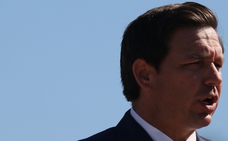 Florida Gov. Ron DeSantis, seen here in January, said on Monday that he will issue emergency rules to prevent businesses from requiring proof of vaccination.