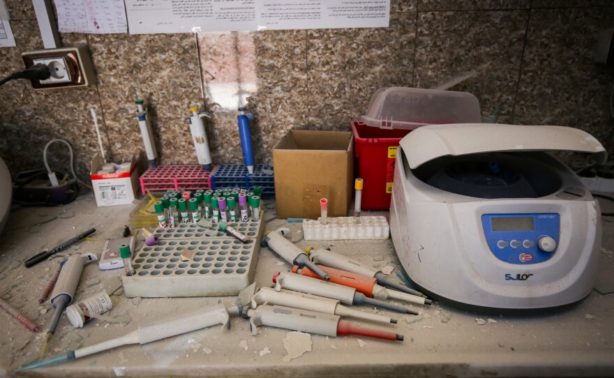 A damaged medical analysis laboratory inside Al-Shifa Hospital in Syria's northern town of Afrin a day after a rocket attack launched by the Syrian government.