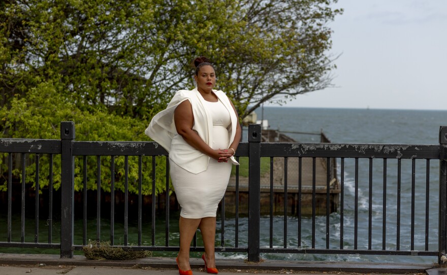 Palencia Mobley, the chief engineer for the city's Department of Water and Sewerage, stands at Mariner Park beside the Detroit River. Mobley says since the flood this past summer she and her team have often been working 12 hour days.