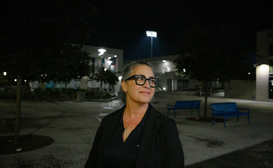 Stephanie Macceca, a teacher at Valhalla High School and former librarian, stands for a portrait outside a meeting of the Grossmont Union High School District governing board at Grossmont High School in El Cajon, California on Oct. 9, 2025. The board discussed several controversial issues, including proposals on religious expression in schools, library leadership changes and rules regarding protests at board meetings.