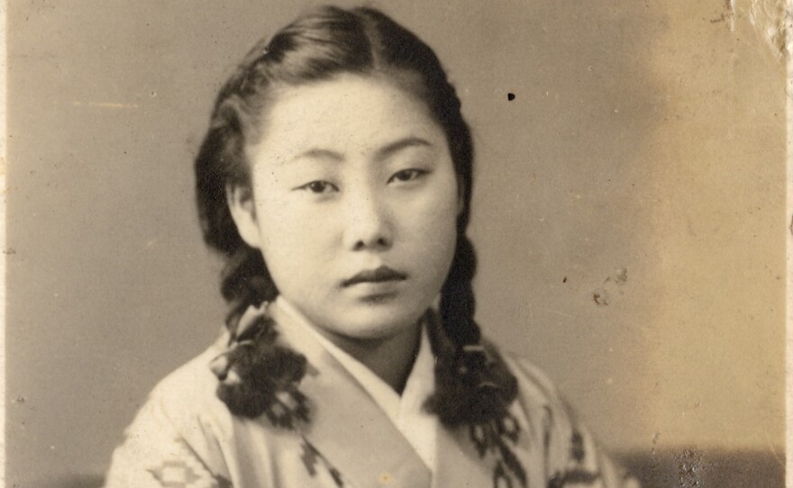 Kikuyo Nakamura as a young girl in traditional dress. She was 21 years old when the bomb was dropped on Nagasaki.