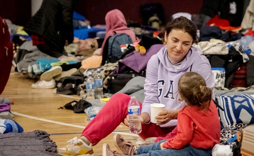 This mother and her young daughter are just two of more than 600 Ukrainian war refugees waiting at the Tijuana's recreation center "Deportiva Benito Juárez", for their chance to cross the border and claim asylum in the United States, April 4, 2022.<br/>