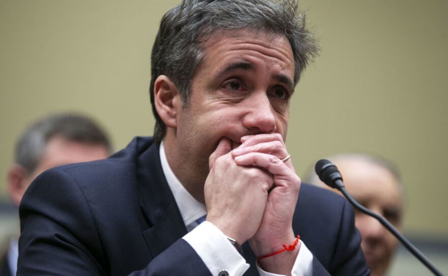 Michael Cohen, former personal lawyer to President Trump, listens to closing statements during a House Oversight Committee hearing in February 2019.
