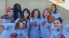 Grace Engleman (center) posing with the School for Entrepreneurship & Technology's all-girls robotics team, the ROARbots, in an undated photo. Engleman, 16, is the team's captain.