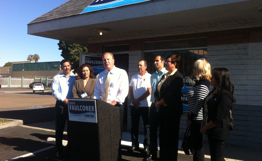 Outside mayoral candidate and Councilman Kevin Faulconer's new campaign office in south San Diego, members of the Latino American Political Association throw their support behind the candidate, Jan. 6, 2014.