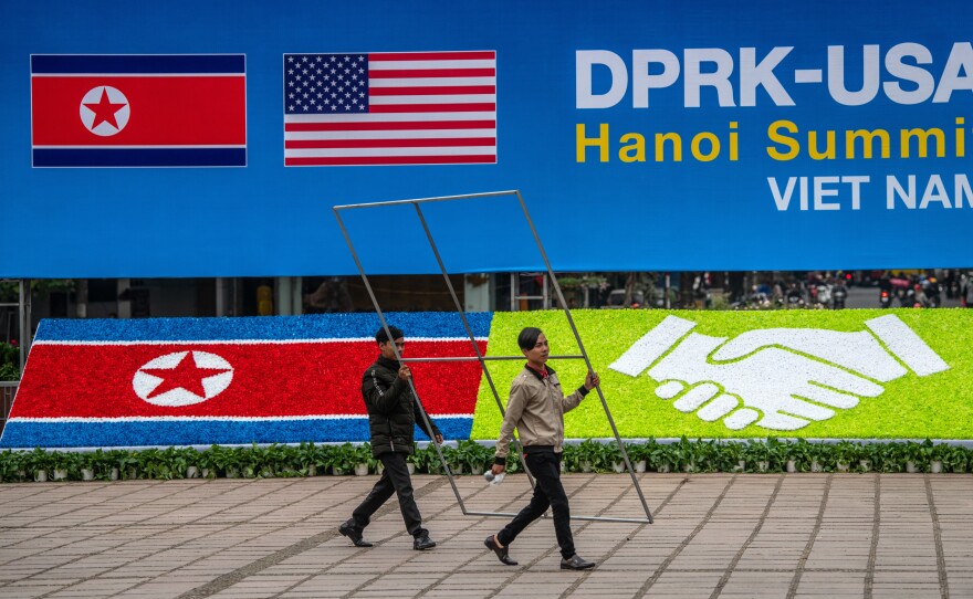 Workers in Hanoi, Vietnam, making last-minute preparations ahead of this week's summit between President Trump and North Korean leader Kim Jong Un.