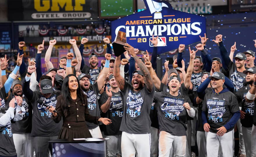Tampa Bay Rays pitcher Freddy Peralta hold the MVP trophy after their win against the Cleveland Guardians in Game 6 of an American League Championship Series baseball game in St. Petersburg, Fla. Monday, Oct. 19, 2026.