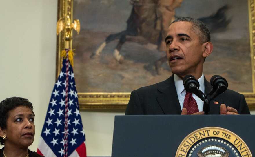President Obama, with Attorney General Loretta Lynch standing by, makes a statement in the Roosevelt Room at the White House following a meeting with his national security team Wednesday.