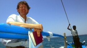 Michael Wood receives an assist from a local Eritrean mariner in in the waters off the Horn of Africa as he searches for the Queen of Sheba.
