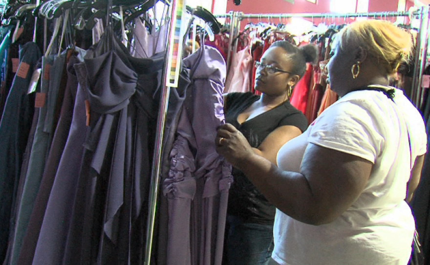 Madison High School senior Sequoia Booker and her mother check out the prom dresses collected by the Princess Project.