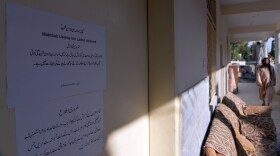 Osama bin Laden is referred to as a shaheed, or martyr, on a sign outside the library at a girls' school in Islamabad.