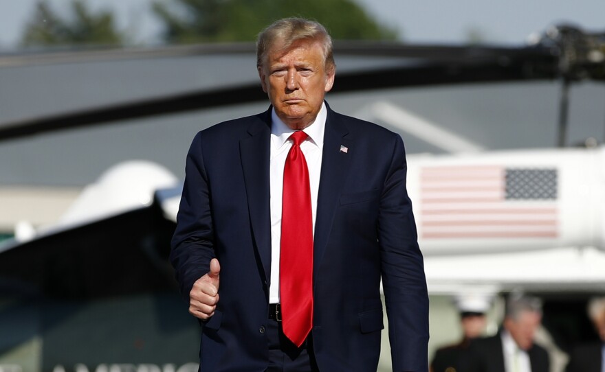 President Trump, shown here on Friday in Bangor, Maine, is questioning the NFL commissioner's stance on player protests.
