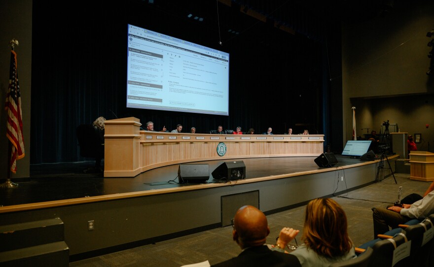 People listen during a meeting of the Grossmont Union High School District governing board at Grossmont High School in El Cajon, California on October 9, 2025. The board discussed several controversial issues, including proposals on religious expression in schools, library leadership changes and rules regarding protests at board meetings.