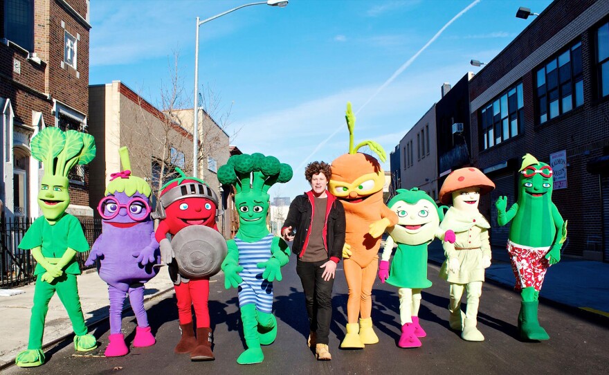 Sammy Spinach (far left), Erica Eggplant, Todd Tomato and other characters in the Super Sprowtz gang with Roger, the super hero trainer (center).