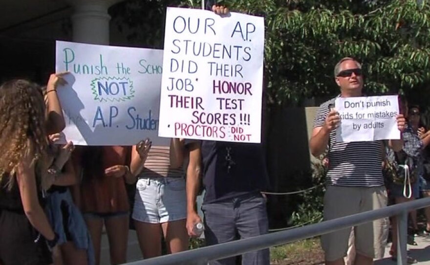 Scripps Ranch High School students and parents protest outside a meeting of San Diego Unified and College Board officials, July 6, 2017.