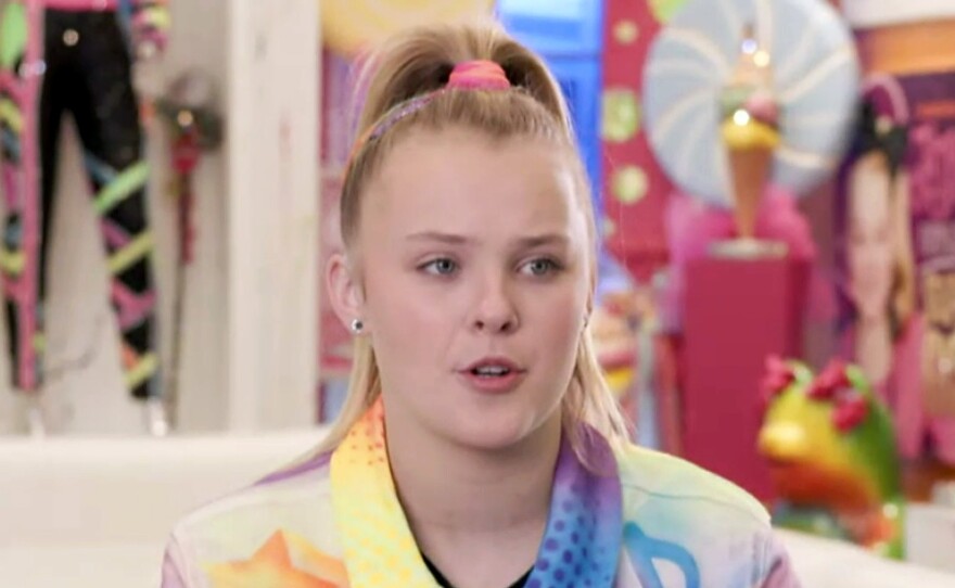 In this screengrab, JoJo Siwa speaks during Instagram and Facebook's Creator Week on June 8, in Los Angeles. Siwa will be dancing with a female pro on this season's Dancing with the Stars.