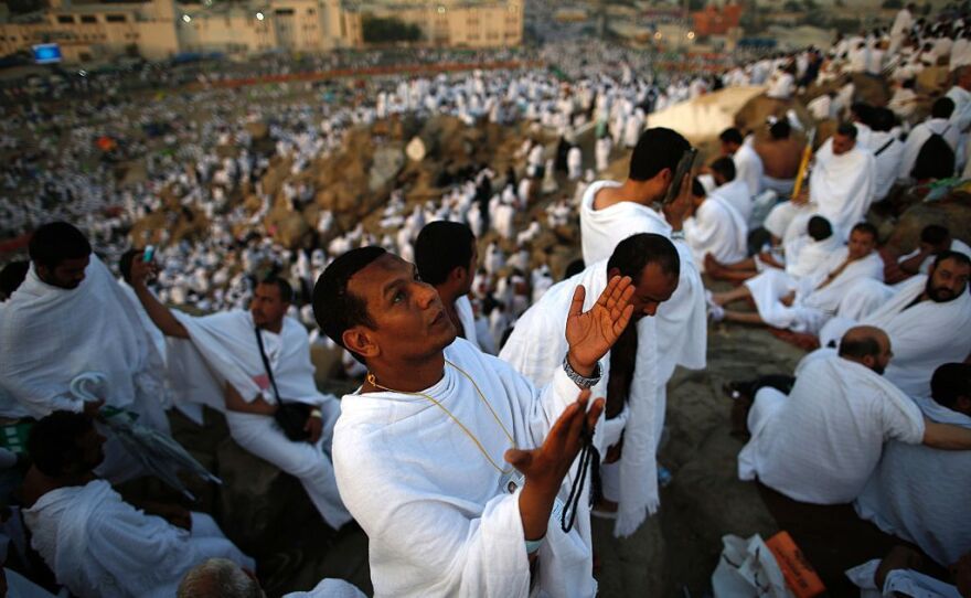 Muslim pilgrims join one of the hajj rituals on Mount Arafat near Mecca early on Sunday.