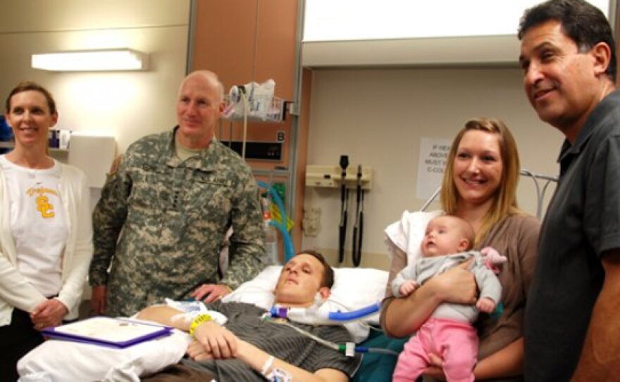 Army Spc. Edward J. Acosta receives the Purple Heart
