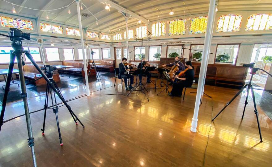 The Hausmann Quartet performs in an empty concert space aboard the Berkeley at the Maritime Museum in September, 2020.