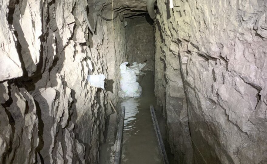 The tunnel is around five and a half feet tall and two feet wide and 4,309 feet long, averaging 70-feet deep and had a ventilation system, electricity and a rail system designed to move large packs of drugs.