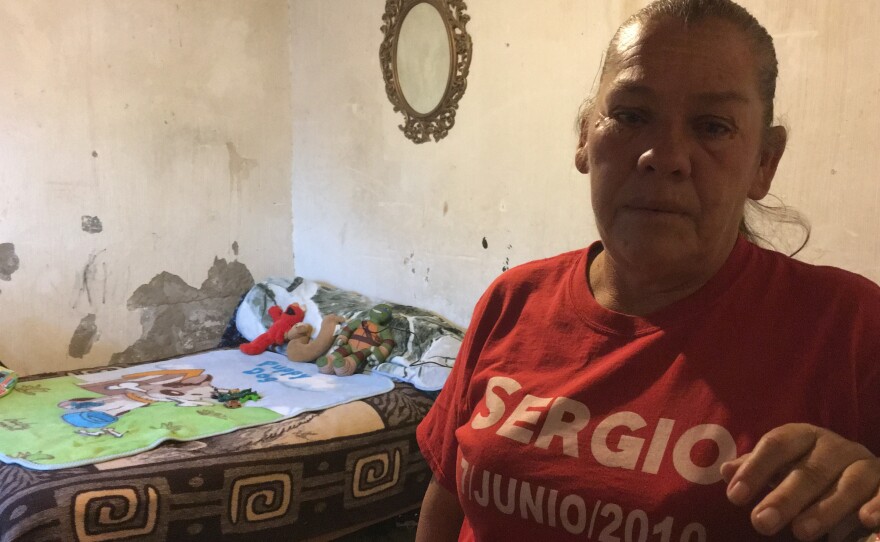 Maria Guadalupe Hernandez stands in the room of her son, Sergio, 15, who was killed in 2010 by a Border Patrol agent shooting from El Paso, Texas, across the river, into Juarez, Mexico. The agent believed the teenager was throwing rocks.