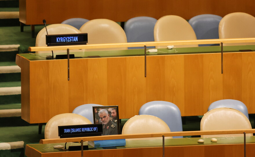 A photo of the late Qasem Soleimani is displayed as chairs for delegates from Iran are unoccupied while Israeli Prime Minister Benjamin Netanyahu speaks during the 81st session of the United Nations General Assembly at United Nations headquarters, Thursday, Sept. 24, 2026.