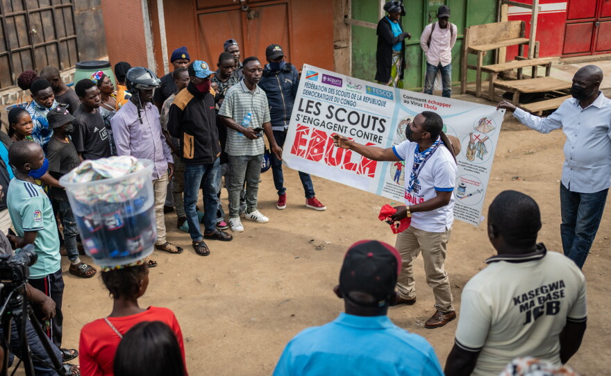 Francois Kasereka, a member of the Congo Scouts movement, speaks to people during a public sensitisation campaign amid the Ebola outbreak in Bunia, Congo, Saturday, May 23, 2026.