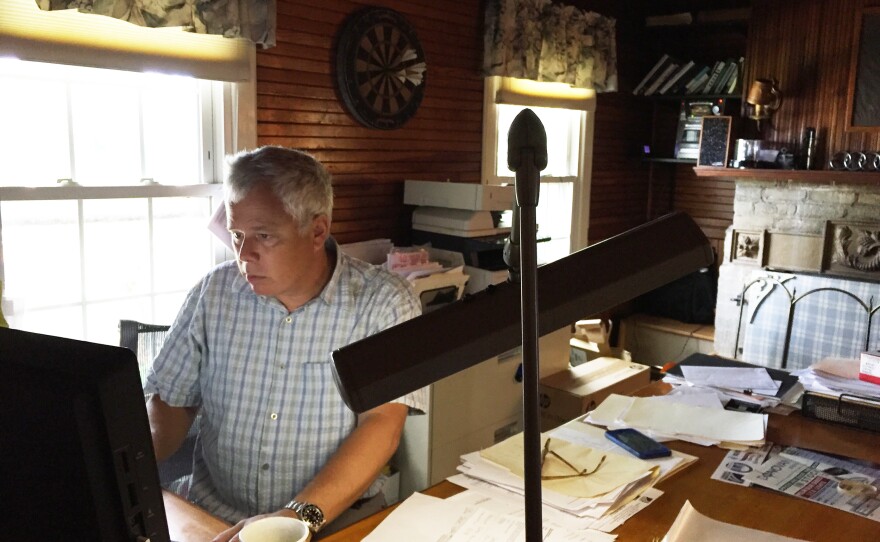 Rob Goldman, co-owner of the New York State Marine Highway Transportation Company, works in his office in Troy, N.Y.