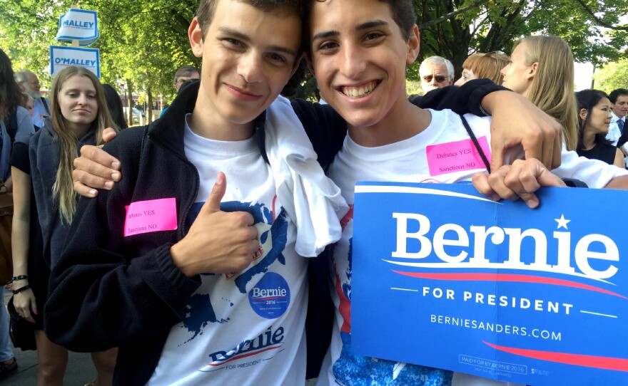 Lucas Lytel (left) and Ben Britt, students at Tufts University, support Bernie Sanders but the O'Malley campaign paid to bus them to New Hampshire to attend a rally for the former Maryland governor.