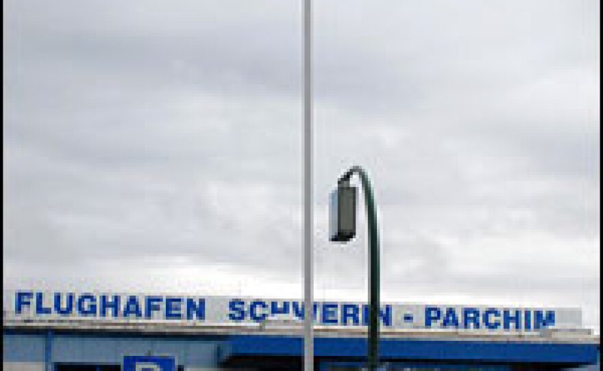 A Chinese flag flies above the terminal of eastern Germany's Parchim International Airport in honor of its new owners, a Chinese firm called LinkGlobal Logistics.