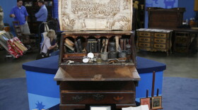 This rare desk, passed down through generations of the owner's family, contains documents from his ancestors in the 1600s all the way through to his grandparents in the 1960s — a veritable archeological dig. Appraiser Andrew Brunk declares the piece a "treasure chest" with a value of $100,000.